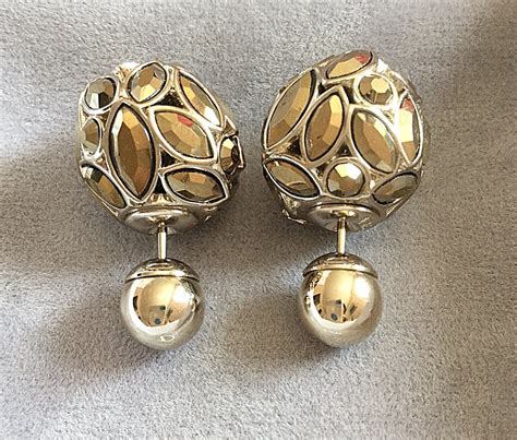 dior tribales clip earrings|mise en Dior tribal earrings.